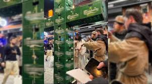 Cadılar Bayramı kutlamalarında bira kasalarıyla haç işareti yaptıkları için gözaltına alındı