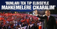 Guantanamo'da olduğu gibi bunları da tek tip elbise ile çıkaralım.